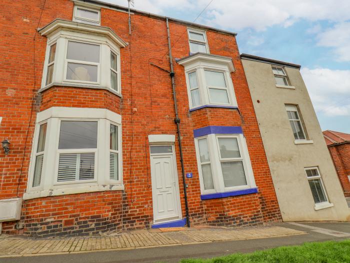 3 Auborough Street, Scarborough, North Yorkshire. Over three floors. 3 bedrooms. Enclosed courtyard.