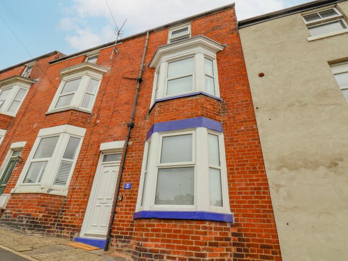 3 Auborough Street, Scarborough, North Yorkshire. Over three floors. 3 bedrooms. Enclosed courtyard.