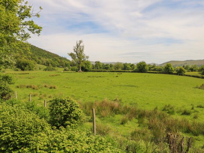 Borrowdale Lodge in Keswick, Cumbria. In a National Park. Off-road parking. Pet-free. Mountain views