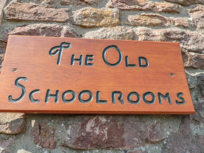 The Old Schoolrooms, in Holcombe, Somerset. Four-bedroom home with games room and hot tub. Pet-free.