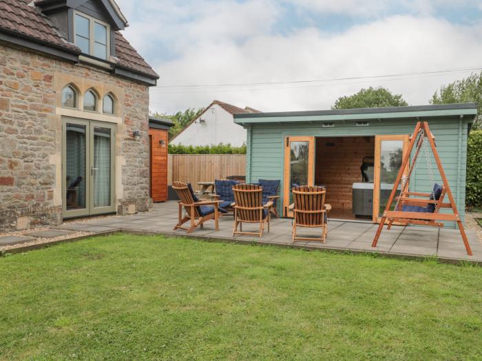 The Old Schoolrooms, in Holcombe, Somerset. Four-bedroom home with games room and hot tub. Pet-free.