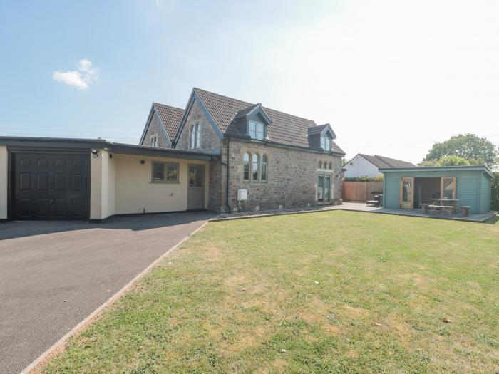 The Old Schoolrooms, in Holcombe, Somerset. Four-bedroom home with games room and hot tub. Pet-free.