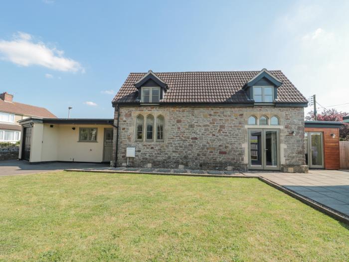 The Old Schoolrooms, in Holcombe, Somerset. Four-bedroom home with games room and hot tub. Pet-free.