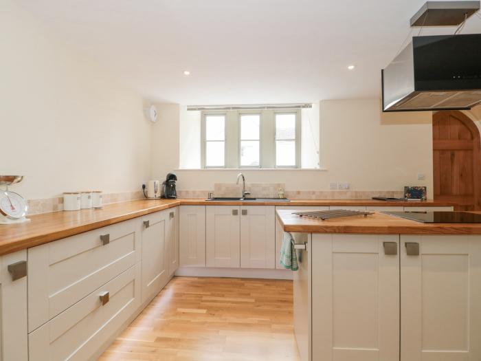 The Old Schoolrooms, in Holcombe, Somerset. Four-bedroom home with games room and hot tub. Pet-free.