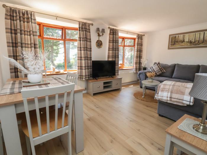 Cock Bank Cottage is near Bangor-On-Dee, Wrexham. Two-bedroom bungalow resting rurally. Pet-friendly