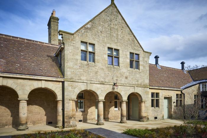 The Hayloft in Humshaugh, Northumberland. Two-bedroom apartment with access to on-site spa. Stylish.