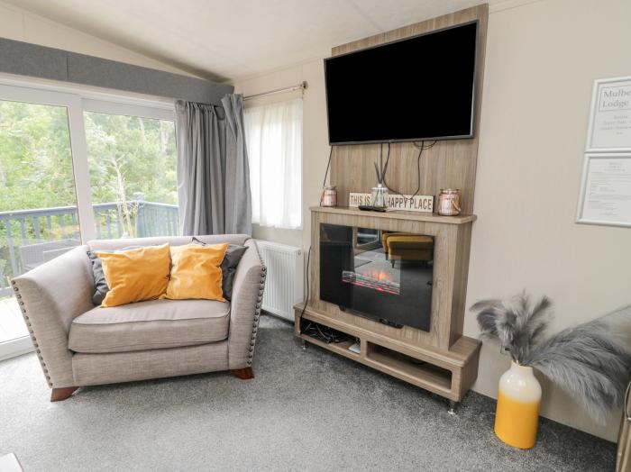 Mulberry lodge, in Felton, Northumberland. Three-bedroom lodge with wrap-around decking and hot tub.