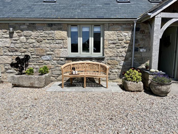 The Riblows nr St Just, Cornwall. Three-bedroom farmhouse with sea views. Hot tub and pretty garden.