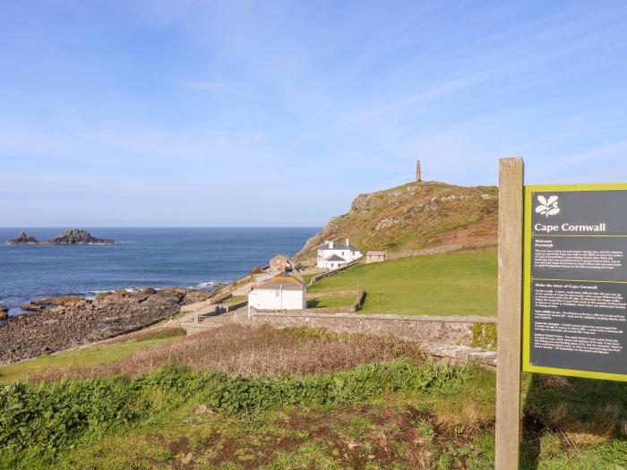 The Riblows nr St Just, Cornwall. Three-bedroom farmhouse with sea views. Hot tub and pretty garden.