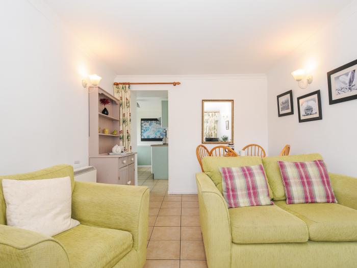 Forge Cottage, Mullion, Cornwall. Lawned garden. Off-road parking. Shared swimming pool. Dishwasher.