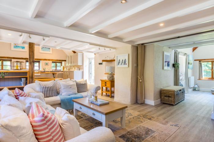 The Coach House is near Padstow, in Cornwall. Four-bedroom, stylish home with expansive garden. Pets