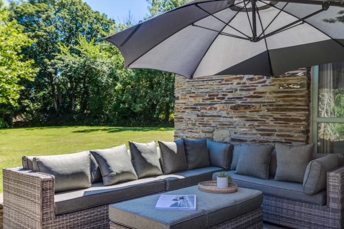 The Coach House is near Padstow, in Cornwall. Four-bedroom, stylish home with expansive garden. Pets