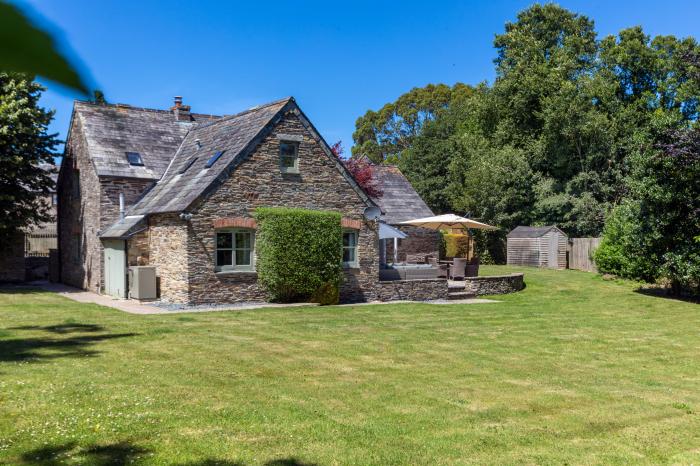 The Coach House is near Padstow, in Cornwall. Four-bedroom, stylish home with expansive garden. Pets