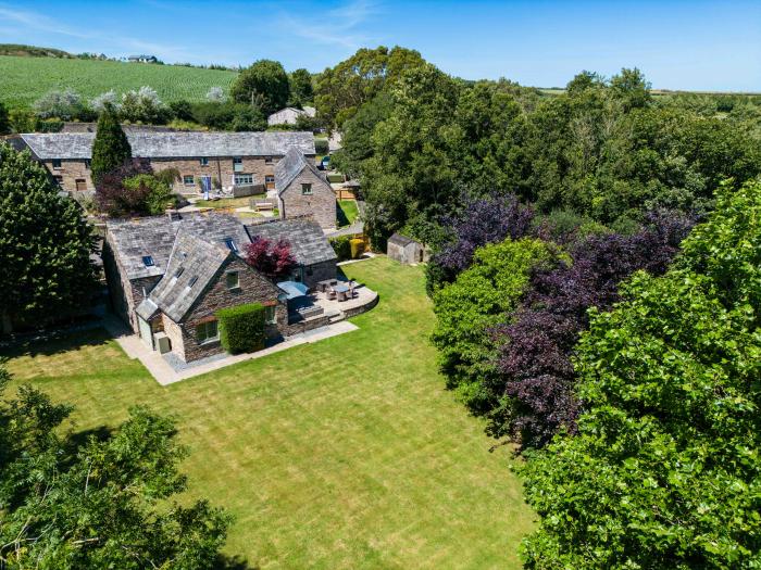 The Coach House is near Padstow, in Cornwall. Four-bedroom, stylish home with expansive garden. Pets