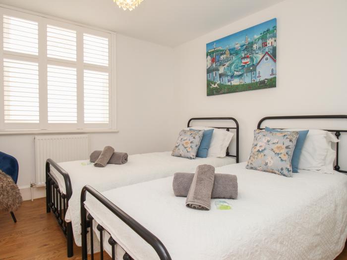 The Cottage, in Weymouth, Dorset. Close to amenities. Close to a beach. Smart TV. Enclosed balcony.