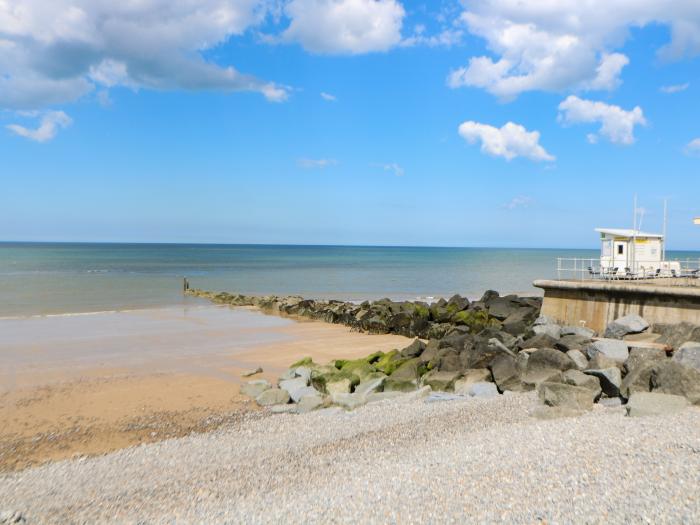 Roof Top, is in Sheringham, Norfolk. Close to amenities and a beach. Roadside parking. Near an AONB.