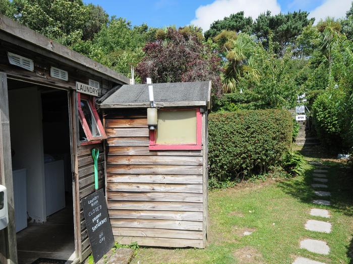 Loft Cottage, Mullion, Cornwall. Smart TV. Electric fire. Off-road parking. Open plan. Pet-friendly.