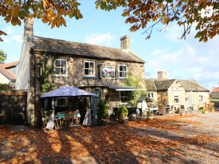 The Old Milkhouse in Eppleby, North Yorkshire. Reverse-level. Set on the village green. Pet-friendly