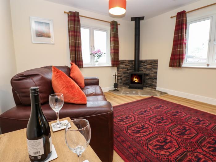 The Old Milkhouse in Eppleby, North Yorkshire. Reverse-level. Set on the village green. Pet-friendly