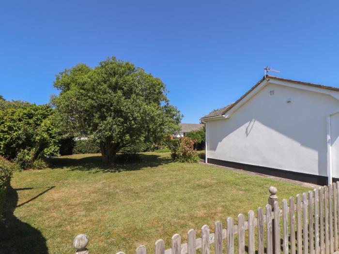 Compass Point, is in Camborne, Cornwall. Two-bedroom bungalow with enclosed gardens. Near amenities.