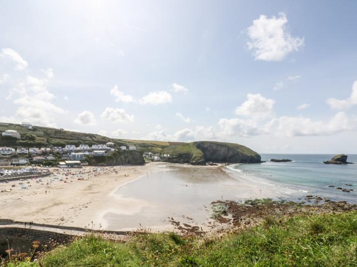 Compass Point, is in Camborne, Cornwall. Two-bedroom bungalow with enclosed gardens. Near amenities.