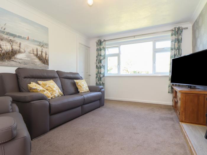 Compass Point, is in Camborne, Cornwall. Two-bedroom bungalow with enclosed gardens. Near amenities.