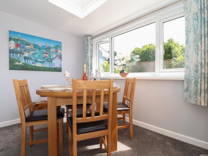 Compass Point, is in Camborne, Cornwall. Two-bedroom bungalow with enclosed gardens. Near amenities.