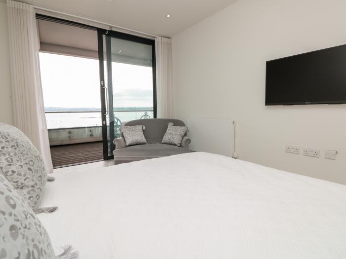 20 Abbey Sands, in Torquay, Devon. Two-bedroom apartment, overlooking the beach. Close to amenities.