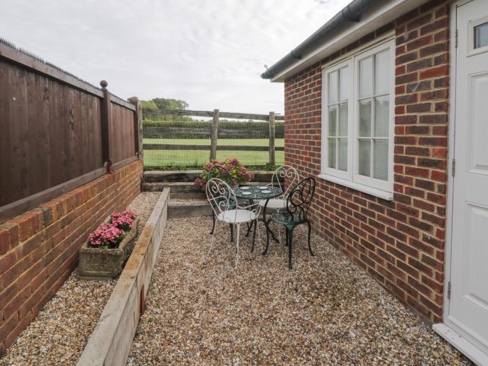 Aluph House is near Wye, in Kent. Two-bedroom cottage with shared garden and tennis court. Near AONB