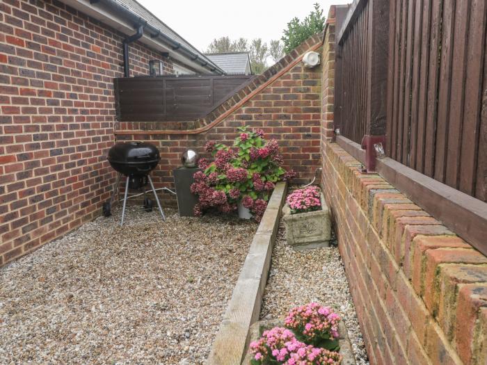 Aluph House is near Wye, in Kent. Two-bedroom cottage with shared garden and tennis court. Near AONB