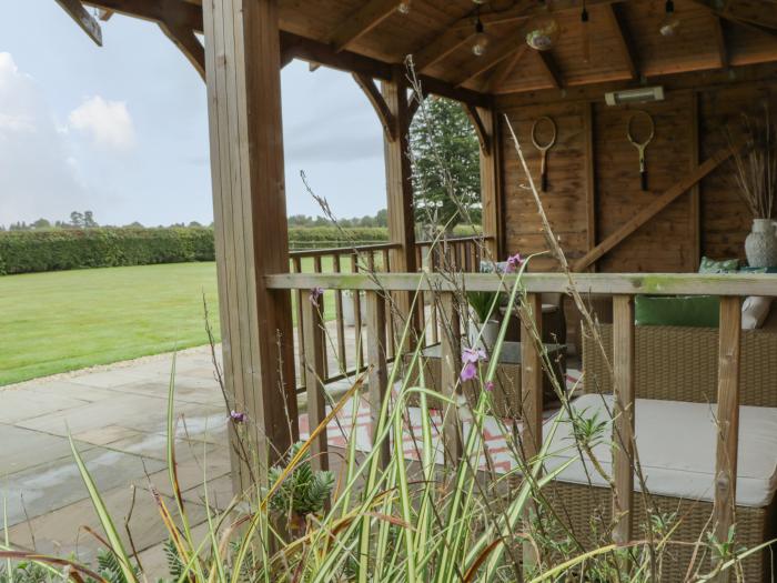 Aluph House is near Wye, in Kent. Two-bedroom cottage with shared garden and tennis court. Near AONB