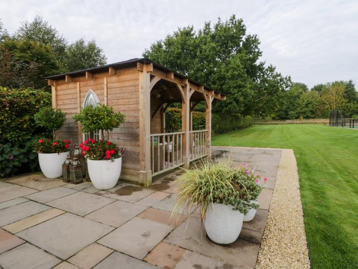 Aluph House is near Wye, in Kent. Two-bedroom cottage with shared garden and tennis court. Near AONB