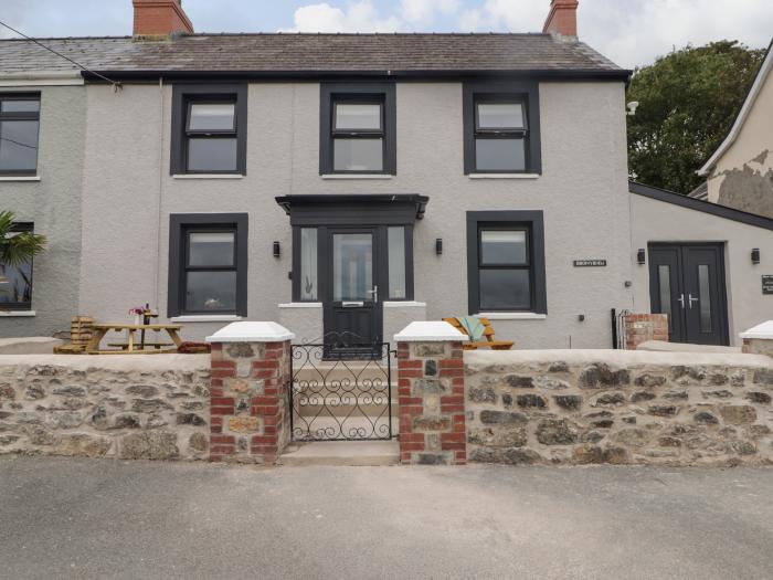 Bronyrhiw, in Goodwick, Pembrokeshire. Three-bedroom home with sea views and enclosed gardens. Pets.