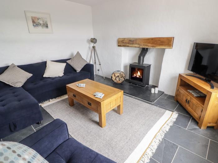 Bronyrhiw, in Goodwick, Pembrokeshire. Three-bedroom home with sea views and enclosed gardens. Pets.