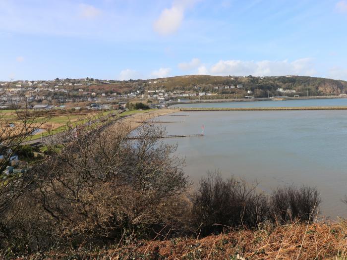 Bronyrhiw, in Goodwick, Pembrokeshire. Three-bedroom home with sea views and enclosed gardens. Pets.