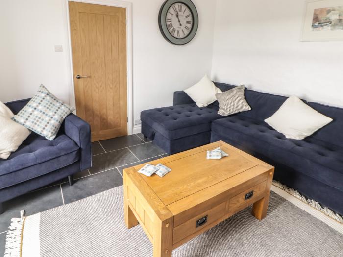 Bronyrhiw, in Goodwick, Pembrokeshire. Three-bedroom home with sea views and enclosed gardens. Pets.