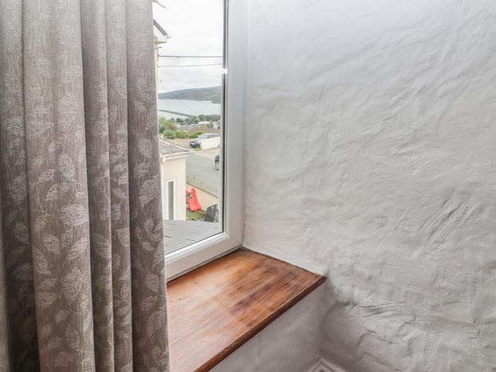 Bronyrhiw, in Goodwick, Pembrokeshire. Three-bedroom home with sea views and enclosed gardens. Pets.