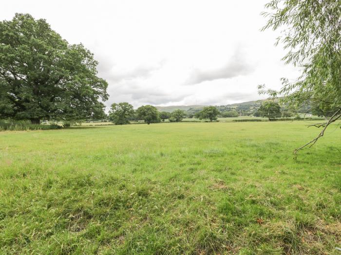 Upper Gardener's Cottage in Llandyrnog near Denbigh, Denbighshire. Off-road parking. Hot tub. Pets.