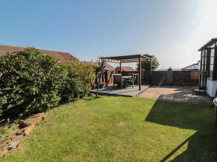 23 Carvers Court, Brotton, North Yorkshire. Four bedrooms. Enclosed garden with furniture & decking.