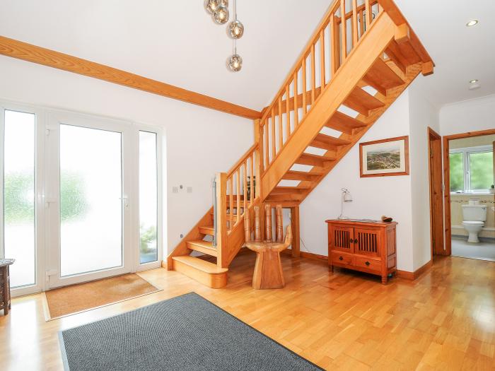 Chy Lowarth in Quintrell Downs, Cornwall. Dormer bungalow. Three bedrooms. Pet-friendly. Woodburner.