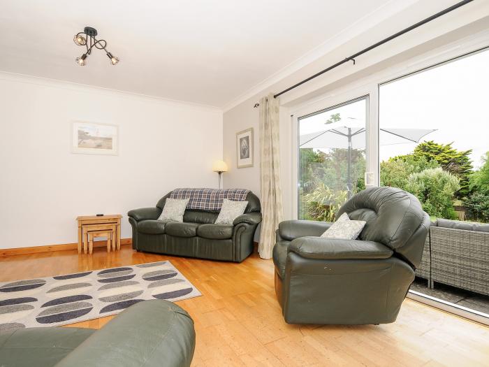 Chy Lowarth in Quintrell Downs, Cornwall. Dormer bungalow. Three bedrooms. Pet-friendly. Woodburner.