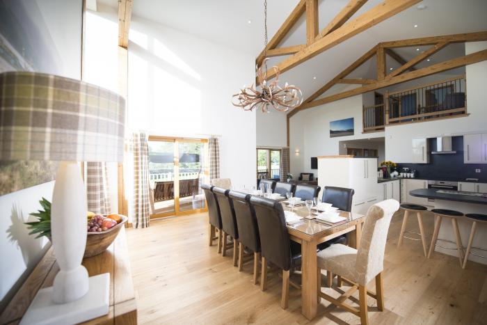 Aurae is in Cawdor, Highlands. Four-bedroom, luxury log cabin with hot tub and sauna. Rural. Family.