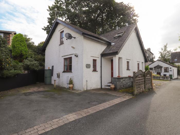 Cherry Tree Cottage is in Windermere, Cumbria. Two-bedroom cottage in National Park. Near amenities.