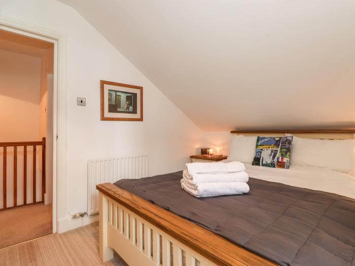 Cherry Tree Cottage is in Windermere, Cumbria. Two-bedroom cottage in National Park. Near amenities.