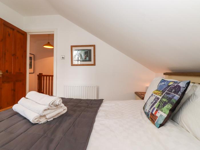 Cherry Tree Cottage is in Windermere, Cumbria. Two-bedroom cottage in National Park. Near amenities.