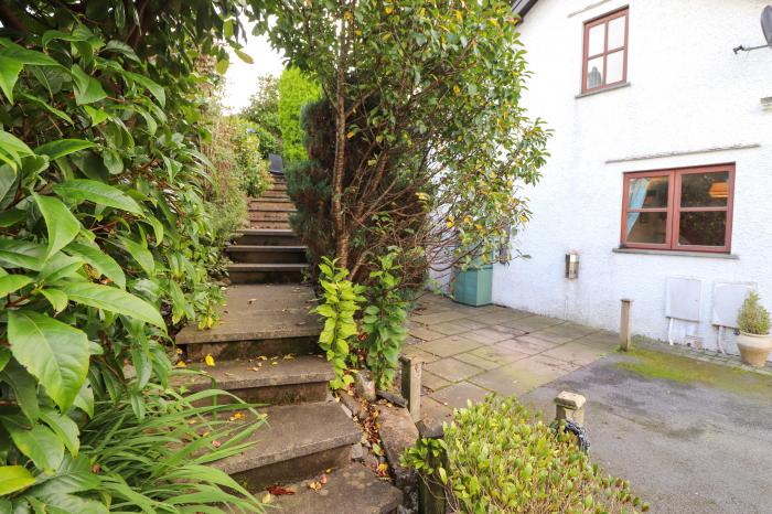 Cherry Tree Cottage is in Windermere, Cumbria. Two-bedroom cottage in National Park. Near amenities.