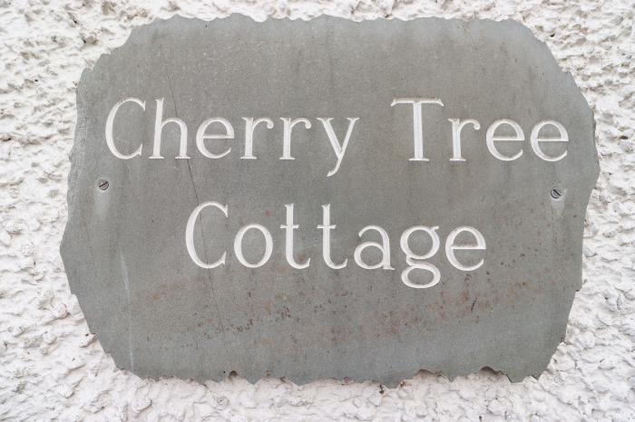 Cherry Tree Cottage is in Windermere, Cumbria. Two-bedroom cottage in National Park. Near amenities.