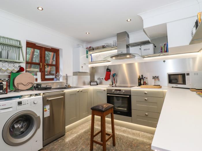 Cherry Tree Cottage is in Windermere, Cumbria. Two-bedroom cottage in National Park. Near amenities.