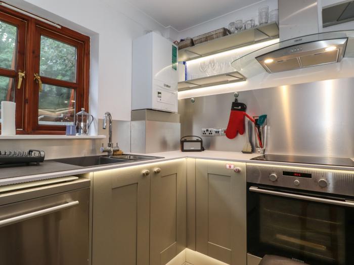 Cherry Tree Cottage is in Windermere, Cumbria. Two-bedroom cottage in National Park. Near amenities.