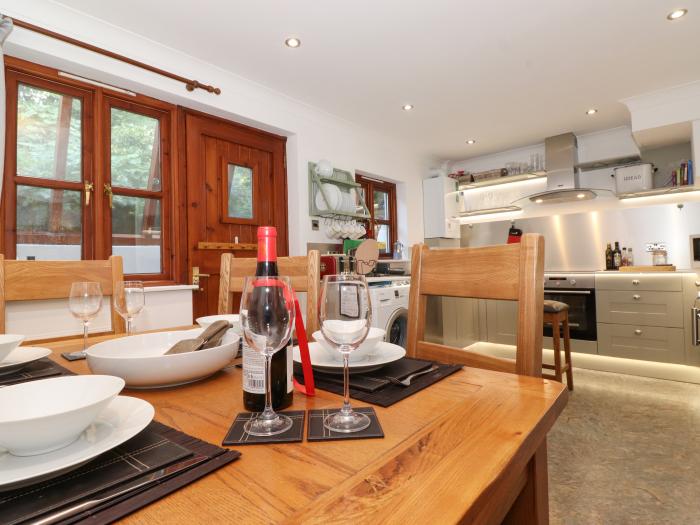 Cherry Tree Cottage is in Windermere, Cumbria. Two-bedroom cottage in National Park. Near amenities.